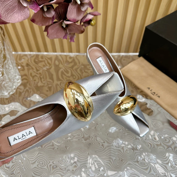 DÉCOLLETÉ ALAIA AZZEDINE IN VITELLO ARGENTO CON FERRAMENTA ORO