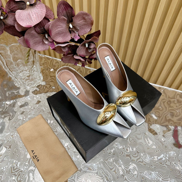 DÉCOLLETÉ ALAIA AZZEDINE IN VITELLO ARGENTO CON FERRAMENTA ORO