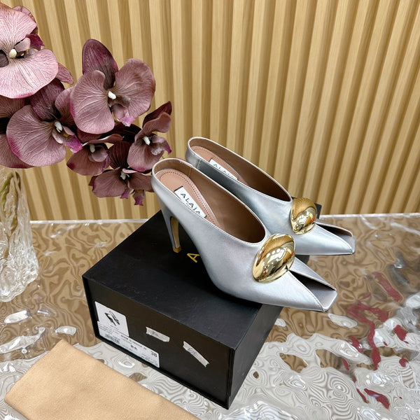 DÉCOLLETÉ ALAIA AZZEDINE IN VITELLO ARGENTO CON FERRAMENTA ORO