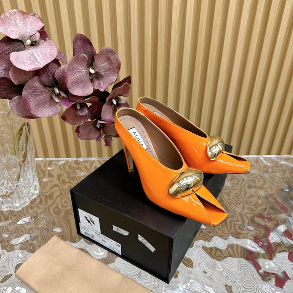 DÉCOLLETÉ ALAIA AZZEDINE IN PELLE DI VITELLO ARANCIONE MANDARINO CON FERRAMENTA ORO