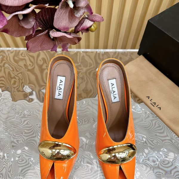 DÉCOLLETÉ ALAIA AZZEDINE IN PELLE DI VITELLO ARANCIONE MANDARINO CON FERRAMENTA ORO