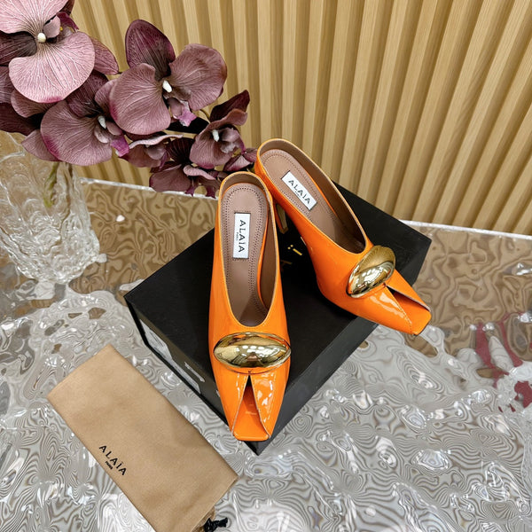 DÉCOLLETÉ ALAIA AZZEDINE IN PELLE DI VITELLO ARANCIONE MANDARINO CON FERRAMENTA ORO
