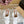 SANDALI ALAIA ELASTIC CAGE MULE IN CINTURINO INTRECCIATO BIANCO E PELLE DI AGNELLO