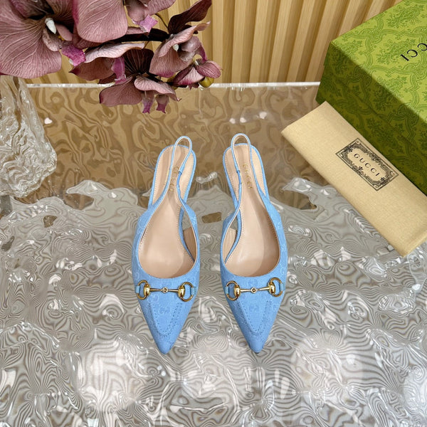 DÉCOLLETÉ CON CINTURINO E MORSETTO DA DONNA IN TELA CIELO