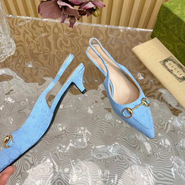 DÉCOLLETÉ CON CINTURINO E MORSETTO DA DONNA IN TELA CIELO