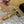 Ballerine Alaia in pelle di vacchetta intrecciata color oro 102288