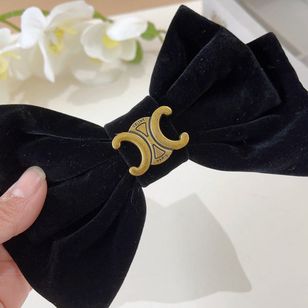 FORCINA IN VELLUTO NERO CON LOGO ORO 387059