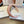 LIGHT PINK FABRIC HAIRBAND WITH GOLD LOGO 414436