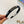HEADBAND IN BLACK PATENT CALFSKIN SILVER LOGO 427344