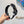 BOW HAIRBAND IN BLACK MIX WHITE RESIN AND FABRIC 432749