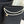 Chanel 25 Stivali lunghi con doppia C e perle a quadrifoglio in pelle di pecora intrecciata nera 465407