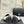 Mocassins à double boucle C en cuir de veau noir et blanc CC 25s 557705