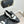 Mocassins à double boucle C en cuir de veau noir et blanc CC 25s 557705