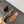 MULES ALAIA FLAT IN RETE MARRONE RAME