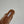 MULES ALAIA FLAT IN RETE MARRONE RAME