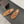MULES ALAIA FLAT IN RETE MARRONE RAME