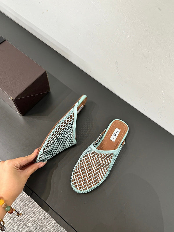 MULES ALAIA FLAT IN RETE AZZURRA