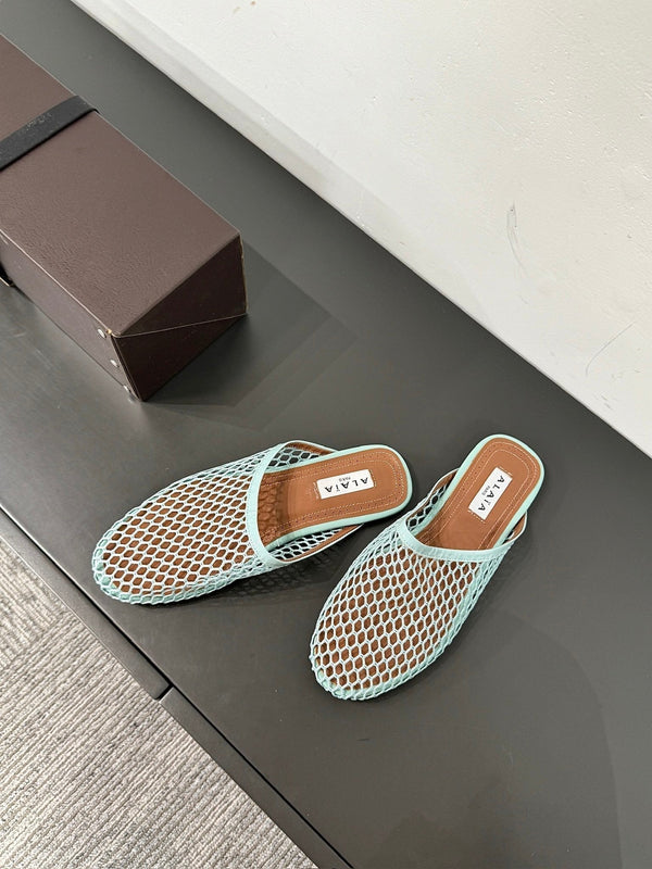 MULES ALAIA FLAT IN RETE AZZURRA