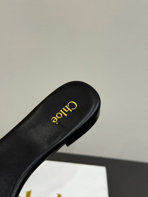 Loewe 25 Bow Metal Buckle Slide Nero Pelle di vacchetta