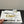 Loewe 25 Bow Metal Buckle Slide Bianco Pelle di mucca