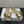 Loewe 25 Bow Metal Buckle Slide Pelle di vacchetta dorata