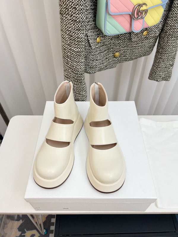 The Row 2025 Botte en peau de mouton blanc cassé 576057
