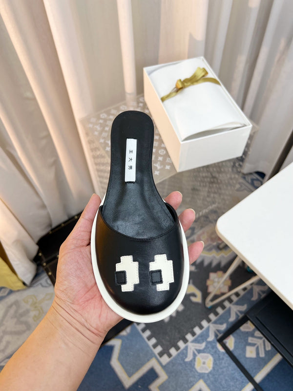 The Row Semi Slippers Black Sheepskin 827492
