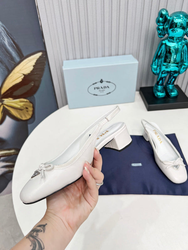 Prad 26s Round Toe Slingback Pumps 40mm In White Calfskin With Bow