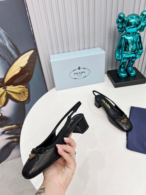 Prad 26s Round Toe Slingback Pumps 40mm In Black Calfskin With Bow