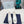 Prad 26s Round Toe Pumps Block Heel 40mm In White Calfskin With Bow