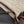 Loewe Pochette Slit en raphia beige et veau marron
