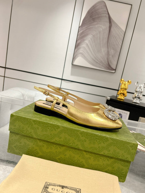SCARPE BASSE METALLICHE CON CINTURINO IN PELLE DI VITELLO ORO