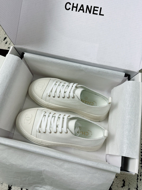Baskets montantes CC en coton blanc et caoutchouc 696672