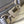 PORTE-DOCUMENTS VOYAGE PM 36 IN DOVE GRAY CALFSKIN