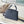 CAPUCINES EAST-WEST 27 IN BLACK TAURILLON