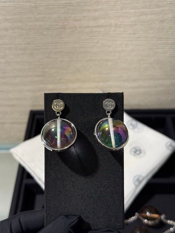 Chanel 2026 Transparent Iridescent Crystal Ball Planet Silver Button Double C Earrings