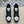 LV TRAINERS IN BLACK CALFSKIN AND WHITE JACQUARD