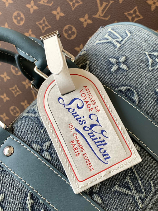 LV Keepall Bandoulière 25 Monogram blu denim lavato e pelle di mucca