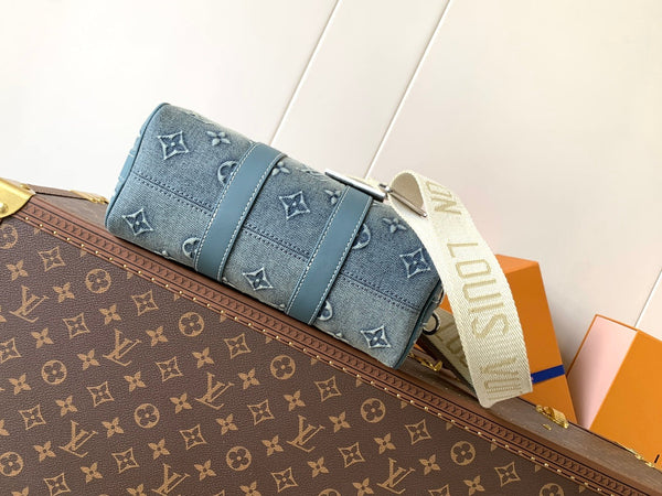 LV Keepall Bandoulière 25 Monogram blu denim lavato e pelle di mucca