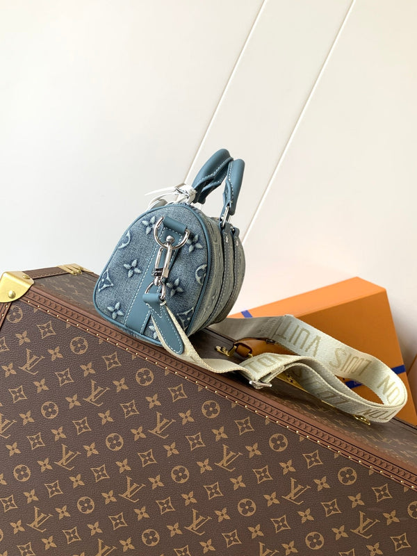 LV Keepall Bandoulière 25 Monogram blu denim lavato e pelle di mucca