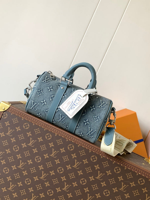 LV Keepall Bandoulière 25 Monogram blu denim lavato e pelle di mucca