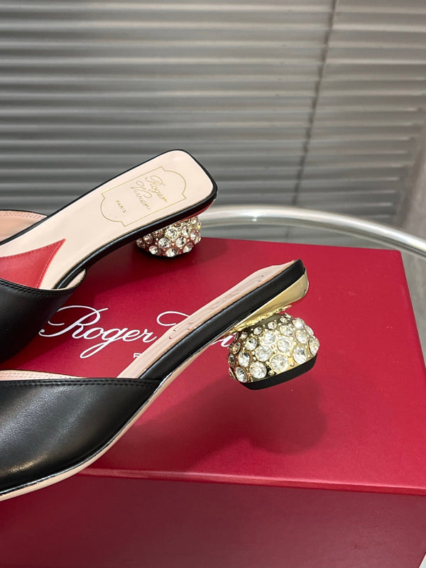 Viv Diamond Sole Mules Black Cowhide 267689