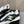 Chanel 26s Sneakers In Black And White Quilted Calfskin CC Logo