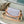 SIDE TRUNK 21 IN GRAY CREAM MONOGRAM TRIANON CANVAS GOLD HARDWARE