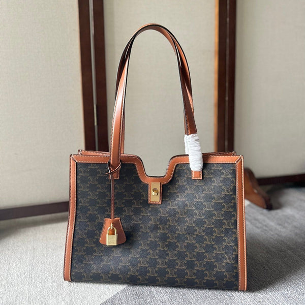 CABAS 37 IN TELA TRIOMPHE NERA E BORDI IN PELLE DI VITELLO MARRONE BRONZO CHIUSURA ORO