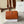 BORSA A TRACOLLA CON PATTA 23 IN PELLE DI AGNELLO MARRONE BRONZO E FERRAMENTA ORO