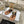 LYMPIA TRIOMPHE THONG IN CALFSKIN BLACK/BROWN