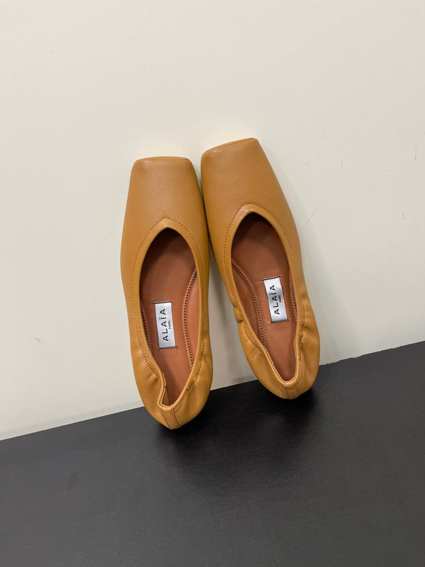 BALLERINE ALAIA IN PELLE DI VITELLO LISCIA MARRONE RAME