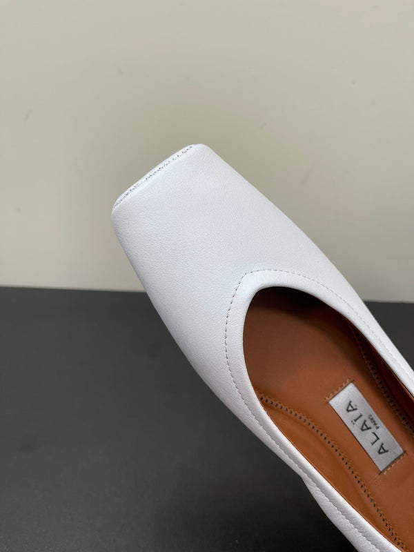 BALLERINE ALAIA IN PELLE DI VITELLO LISCIA BIANCA