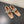 BALLERINE ALAIA IN PELLE DI VITELLO LUCIDA BEIGE MANDORLA CON FERRAMENTA ARGENTATA